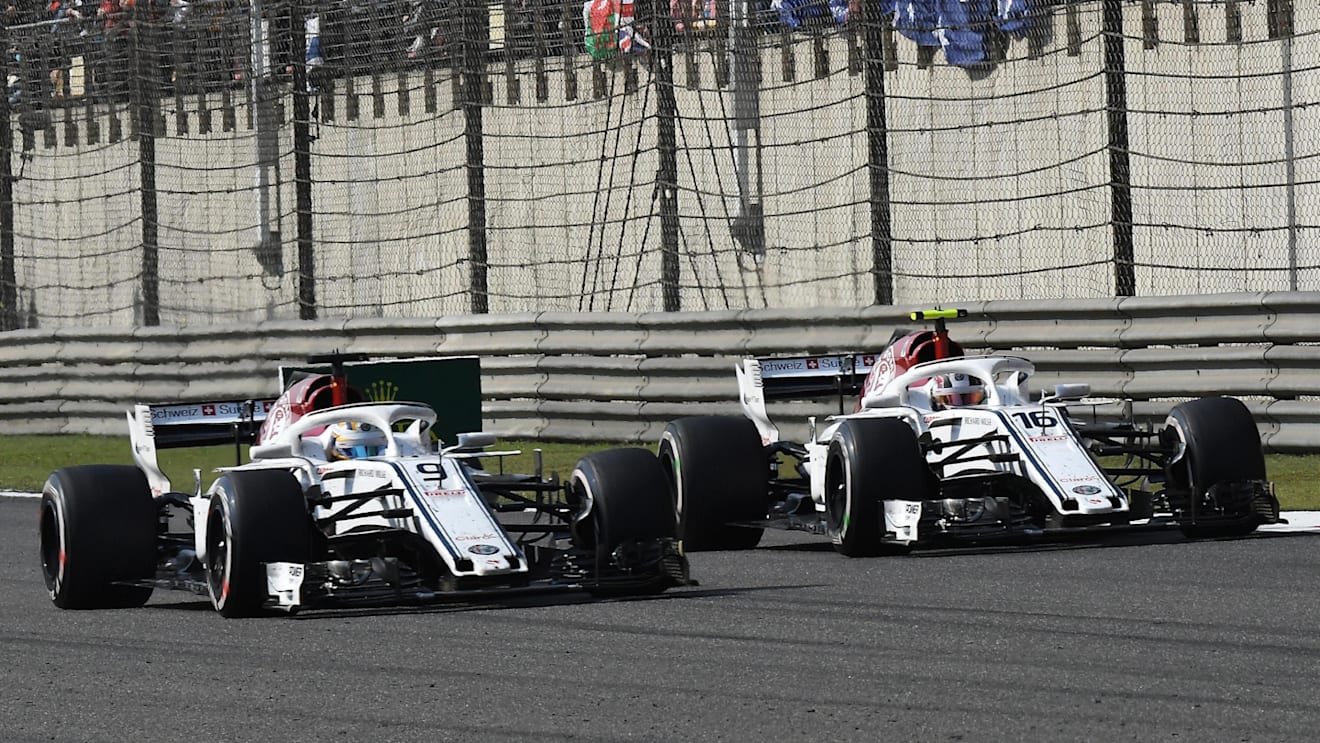 Charles Leclerc (MON) Alfa Romeo Sauber C37 and Marcus Ericsson (SWE) Alfa Romeo Sauber C37 at Formula One World Championship, Rd3, Chinese Grand Prix, Race, Shanghai, China, Sunday 15 April 2018. © Mark Sutton/Sutton Images