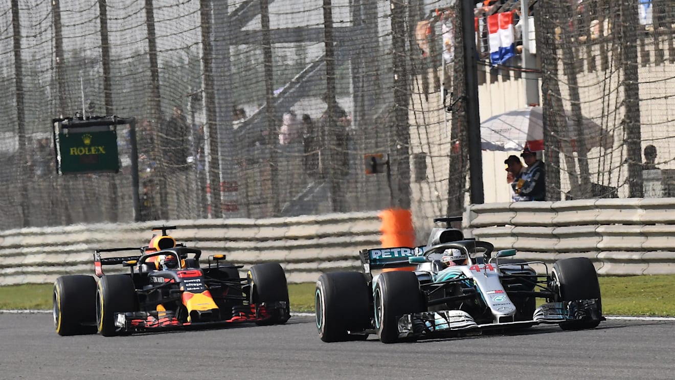 Kimi Raikkonen (FIN) Ferrari SF-71H and Valtteri Bottas (FIN) Mercedes-AMG F1 W09 EQ Power+ battle at Formula One World Championship, Rd3, Chinese Grand Prix, Race, Shanghai, China, Sunday 15 April 2018. © Jerry Andre/Sutton Images