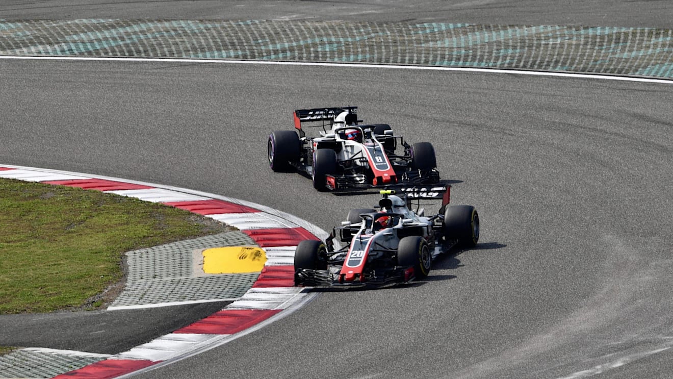 Kevin Magnussen (DEN) Haas VF-18 and Romain Grosjean (FRA) Haas VF-18 at Formula One World Championship, Rd3, Chinese Grand Prix, Race, Shanghai, China, Sunday 15 April 2018. © Jerry Andre/Sutton Images