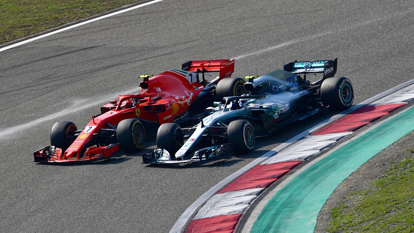 Kimi Raikkonen (FIN) Ferrari SF-71H and Valtteri Bottas (FIN) Mercedes-AMG F1 W09 EQ Power+ battle at Formula One World Championship, Rd3, Chinese Grand Prix, Race, Shanghai, China, Sunday 15 April 2018. © Jerry Andre/Sutton Images