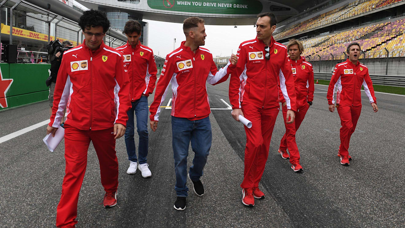 Sebastian Vettel (GER) Ferrari walks the track with Riccardo Adami (ITA) Ferrari Race Engineer at Formula One World Championship, Rd3, Chinese Grand Prix, Preparations, Shanghai, China, Thursday 12 April 2018. © Mark Sutton/Sutton Images