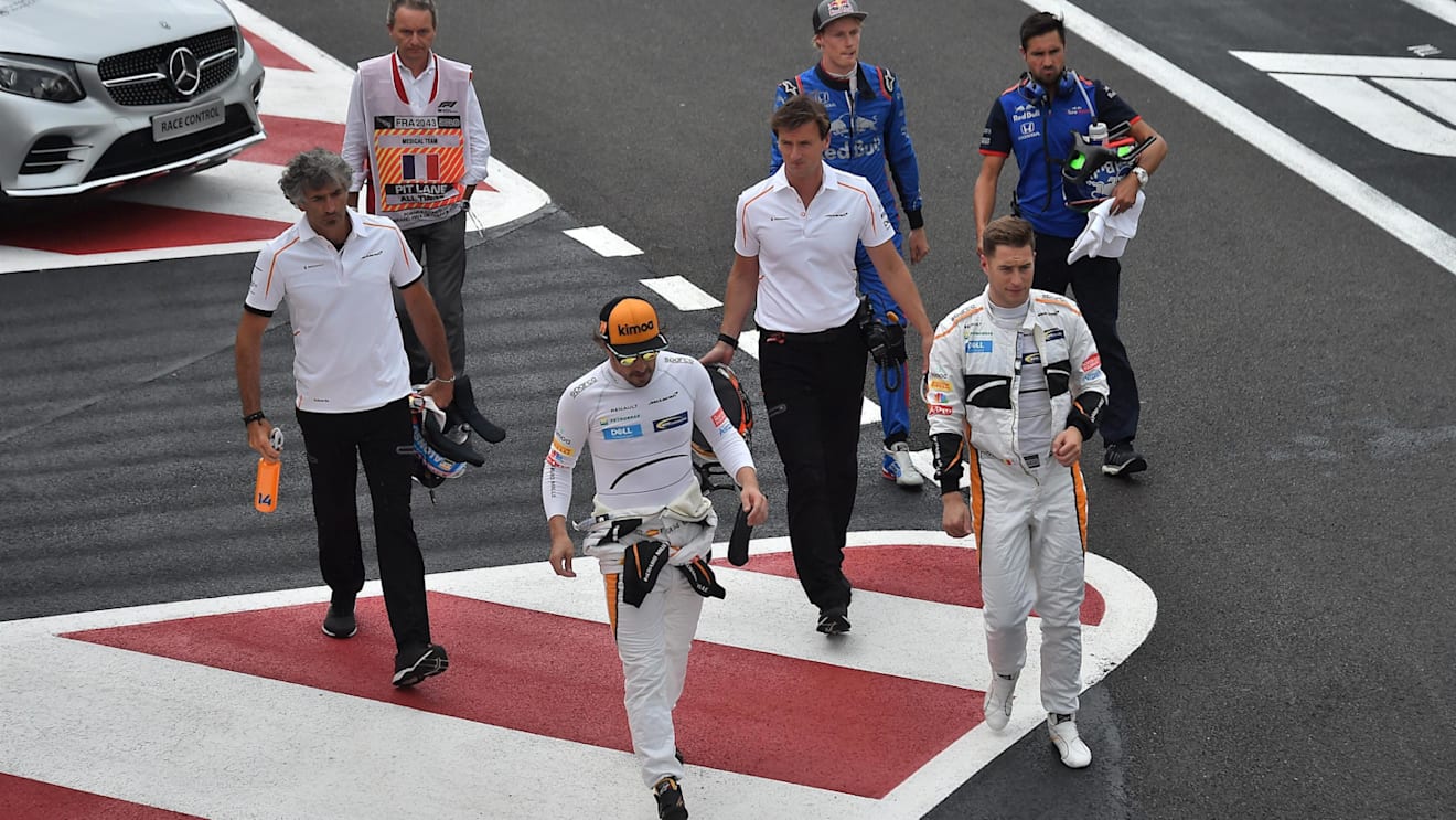 Fernando Alonso (ESP) McLaren, Stoffel Vandoorne (BEL) McLaren and Brendon Hartley (NZL) Scuderia Toro Rosso walk in after Q1 at Formula One World Championship, Rd8, French Grand Prix, Qualifying, Paul Ricard, France, Saturday 23 June 2018. © Jose Rubio/S