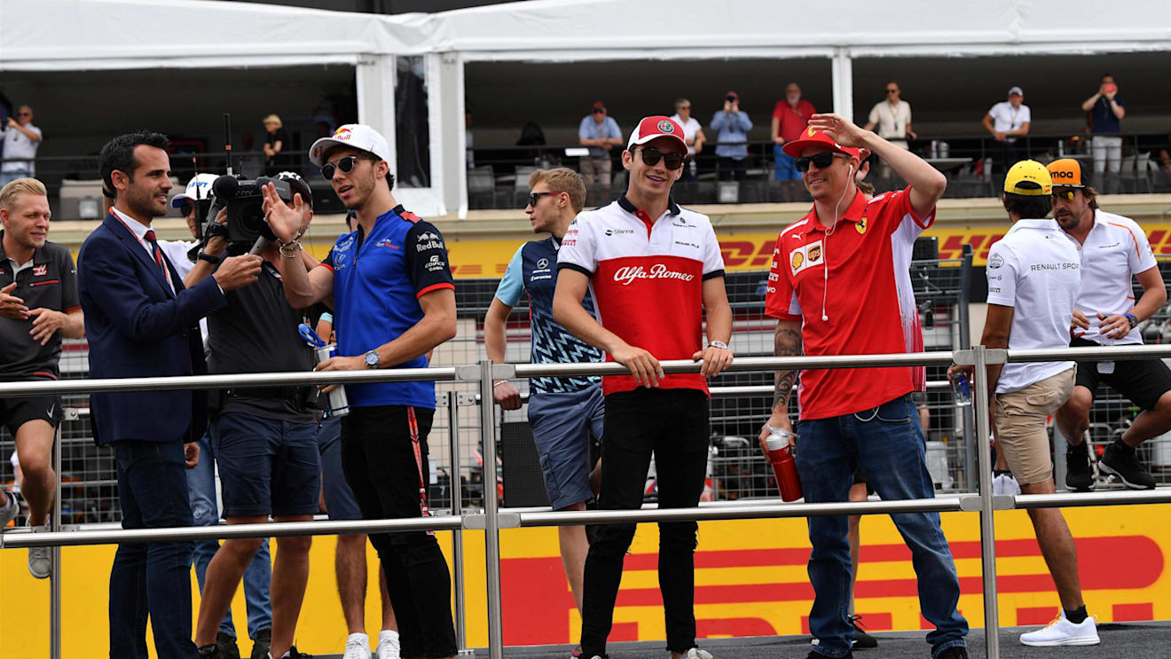 Charles Leclerc (MON) Alfa Romeo Sauber F1 Team and Kimi Raikkonen (FIN) Ferrari on the drivers parade at Formula One World Championship, Rd8, French Grand Prix, Race, Paul Ricard, France, Sunday 24 June 2018. © Mark Sutton/Sutton Images