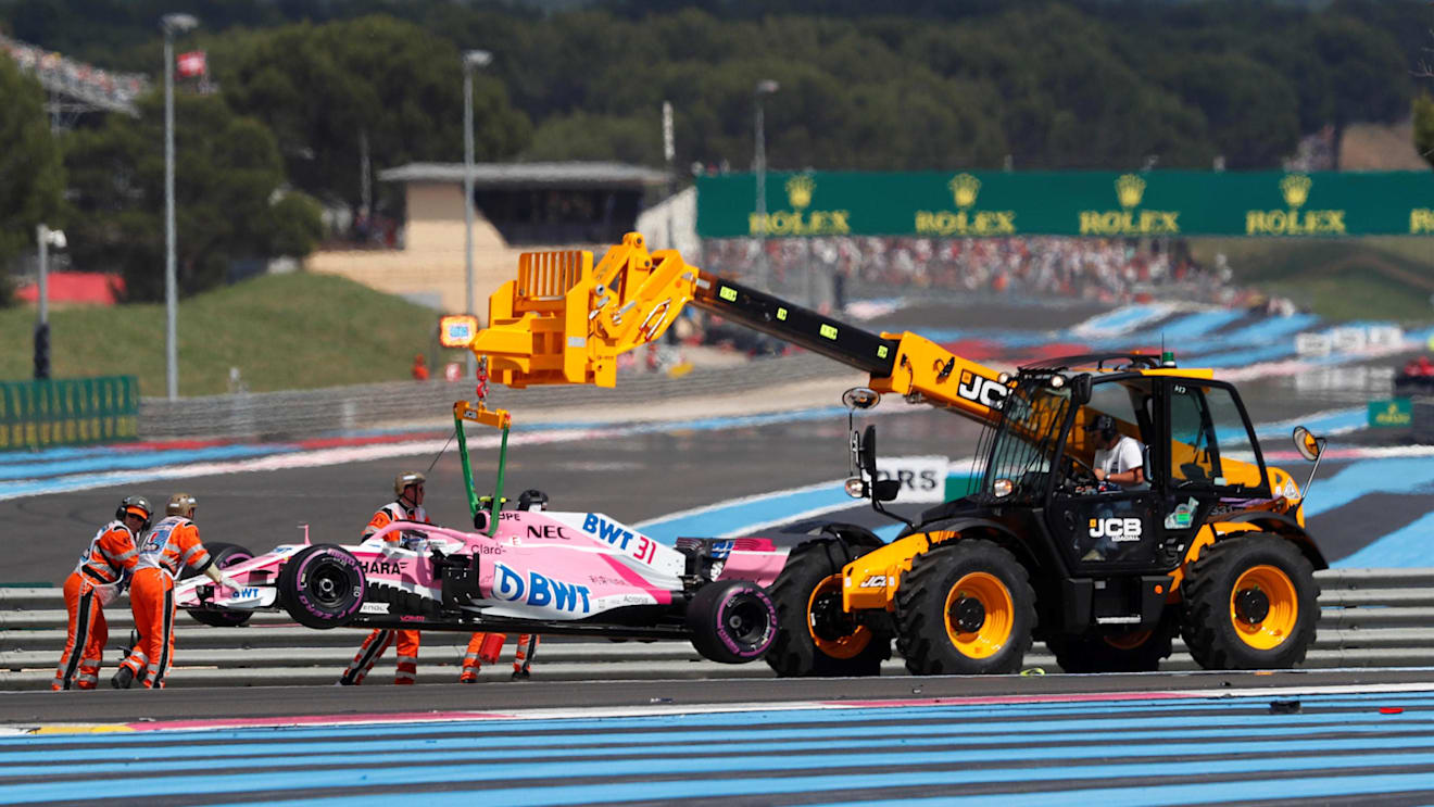 The car of Esteban Ocon (FRA) Force India VJM11 is recovered after crashing on lap one at Formula One World Championship, Rd8, French Grand Prix, Race, Paul Ricard, France, Sunday 24 June 2018. © Steven Tee/LAT/Sutton Images