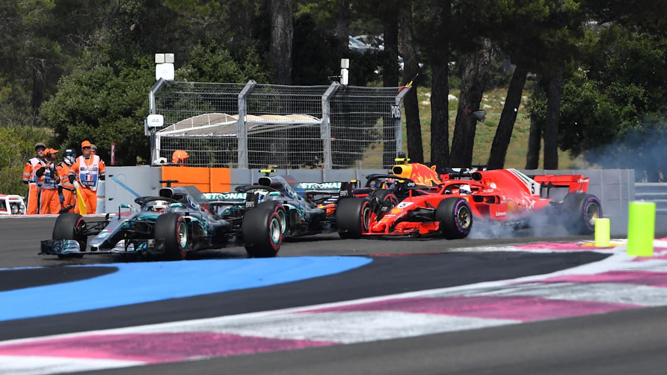 Lewis Hamilton (GBR) Mercedes-AMG F1 W09 EQ Power+ leads at the start of the race as Sebastian Vettel (GER) Ferrari SF-71H locks up at Formula One World Championship, Rd8, French Grand Prix, Race, Paul Ricard, France, Sunday 24 June 2018. © Mark Sutton/Su