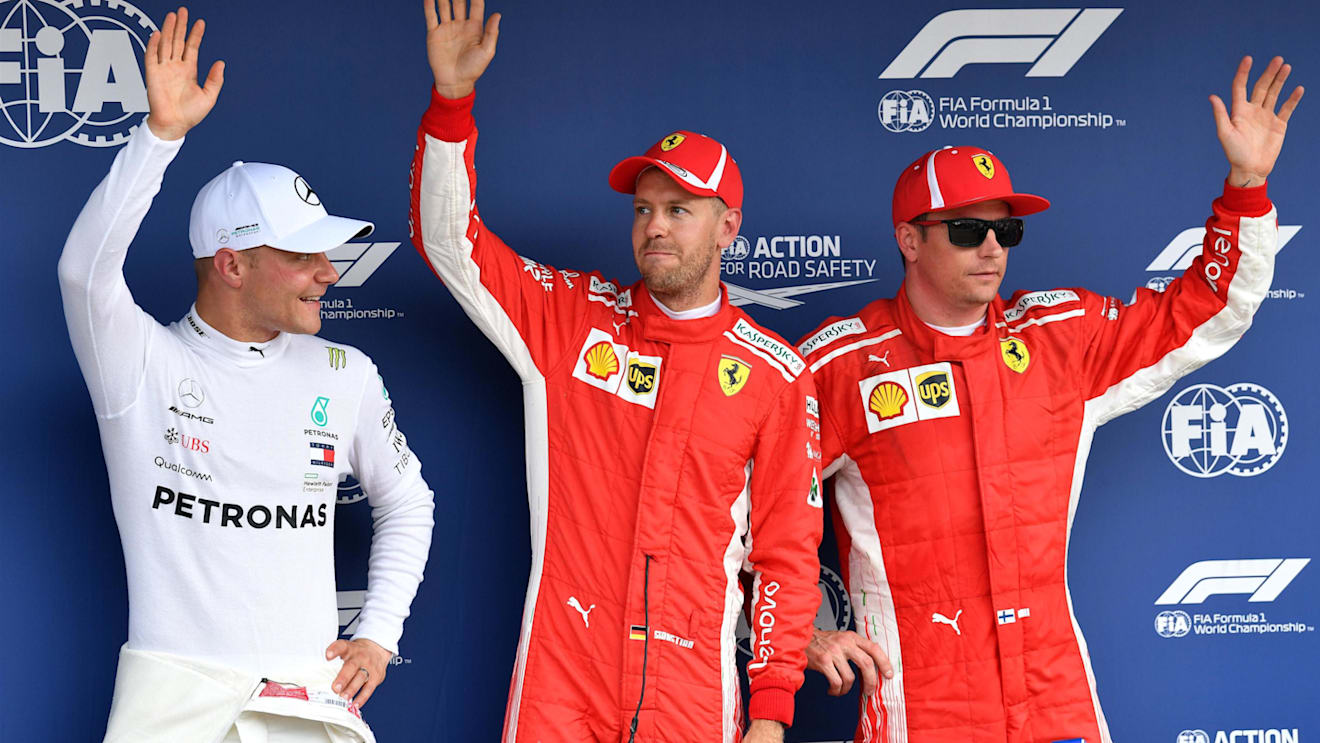 (L to R): Valtteri Bottas (FIN) Mercedes-AMG F1, pole sitter Sebastian Vettel (GER) Ferrari and Kimi Raikkonen (FIN) Ferrari celebrate in parc ferme at Formula One World Championship, Rd11, German Grand Prix, Qualifying, Hockenheim, Germany, Saturday 21 July 2018. © Mark Sutton/Sutton Images