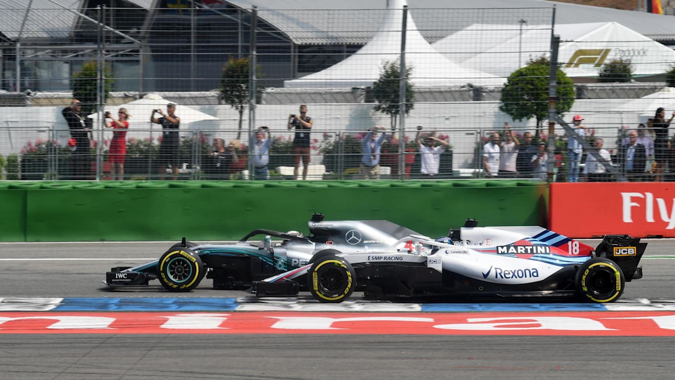 Lewis Hamilton (GBR) Mercedes-AMG F1 W09 EQ Power+ and Lance Stroll (CDN) Williams FW41 battle at Formula One World Championship, Rd11, German Grand Prix, Race, Hockenheim, Germany, Sunday 22 July 2018. © Mark Sutton/Sutton Images