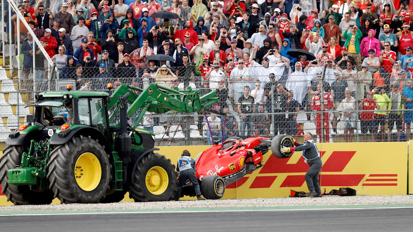 The crashed car of Sebastian Vettel (GER) Ferrari SF-71H is recovered at Formula One World Championship, Rd11, German Grand Prix, Race, Hockenheim, Germany, Sunday 22 July 2018. © Glenn Dunbar/LAT/Sutton Images