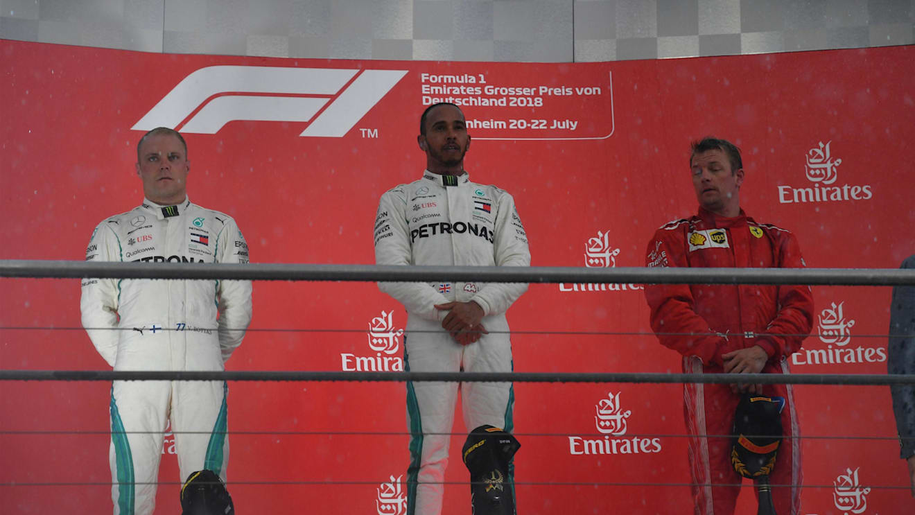 Valtteri Bottas (FIN) Mercedes-AMG F1, Lewis Hamilton (GBR) Mercedes-AMG F1 and Kimi Raikkonen (FIN) Ferrari on the podium at Formula One World Championship, Rd11, German Grand Prix, Race, Hockenheim, Germany, Sunday 22 July 2018. © Mark Sutton/Sutton Images