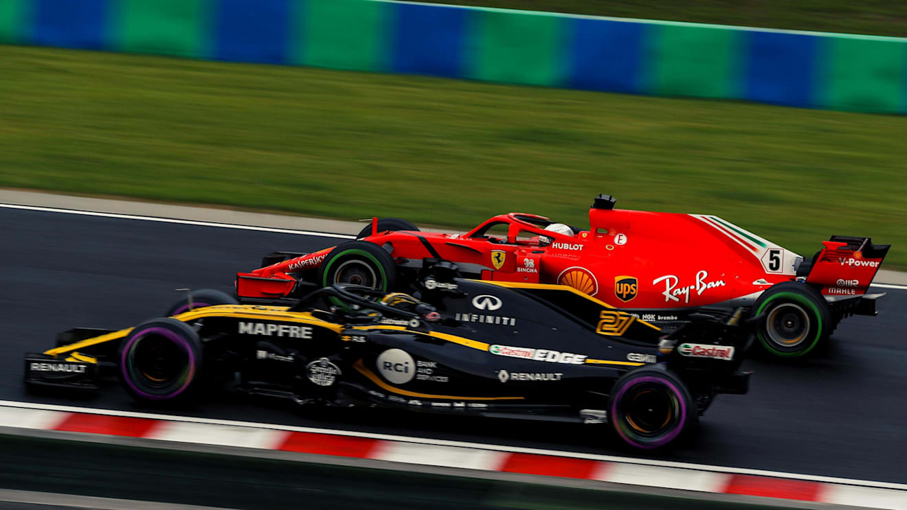 Nico Hulkenberg (GER) Renault Sport F1 Team RS18 and Sebastian Vettel (GER) Ferrari SF-71H at Formula One World Championship, Rd12, Hungarian Grand Prix, Qualifying, Hungaroring, Hungary, Saturday 28 July 2018. © Manuel Goria/Sutton Images