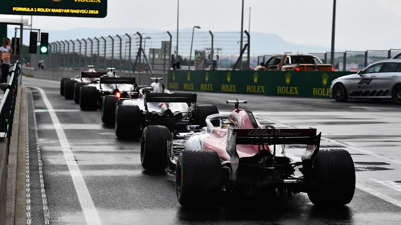 Cars queue in pit lane at Formula One World Championship, Rd12, Hungarian Grand Prix, Qualifying, Hungaroring, Hungary, Saturday 28 July 2018. © Mark Sutton/Sutton Images