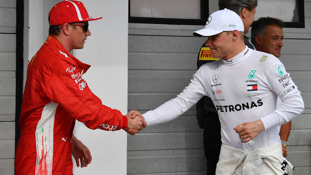 Kimi Raikkonen (FIN) Ferrari and Valtteri Bottas (FIN) Mercedes-AMG F1 celebrate in parc ferme at Formula One World Championship, Rd12, Hungarian Grand Prix, Qualifying, Hungaroring, Hungary, Saturday 28 July 2018. © Mark Sutton/Sutton Images