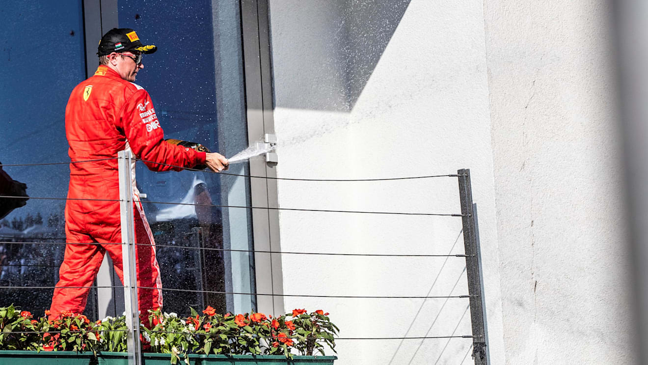 Kimi Raikkonen (FIN) Ferrari celebrates on the podium with the champagne at Formula One World Championship, Rd12, Hungarian Grand Prix, Race, Hungaroring, Hungary, Sunday 29 July 2018. © Manuel Goria/Sutton Images