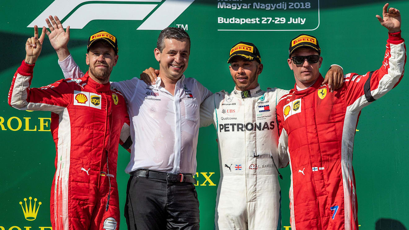 (L to R): Sebastian Vettel (GER) Ferrari, Lewis Hamilton (GBR) Mercedes-AMG F1 and Kimi Raikkonen (FIN) Ferrari celebrate on the podium at Formula One World Championship, Rd12, Hungarian Grand Prix, Race, Hungaroring, Hungary, Sunday 29 July 2018. © Manuel Goria/Sutton Images