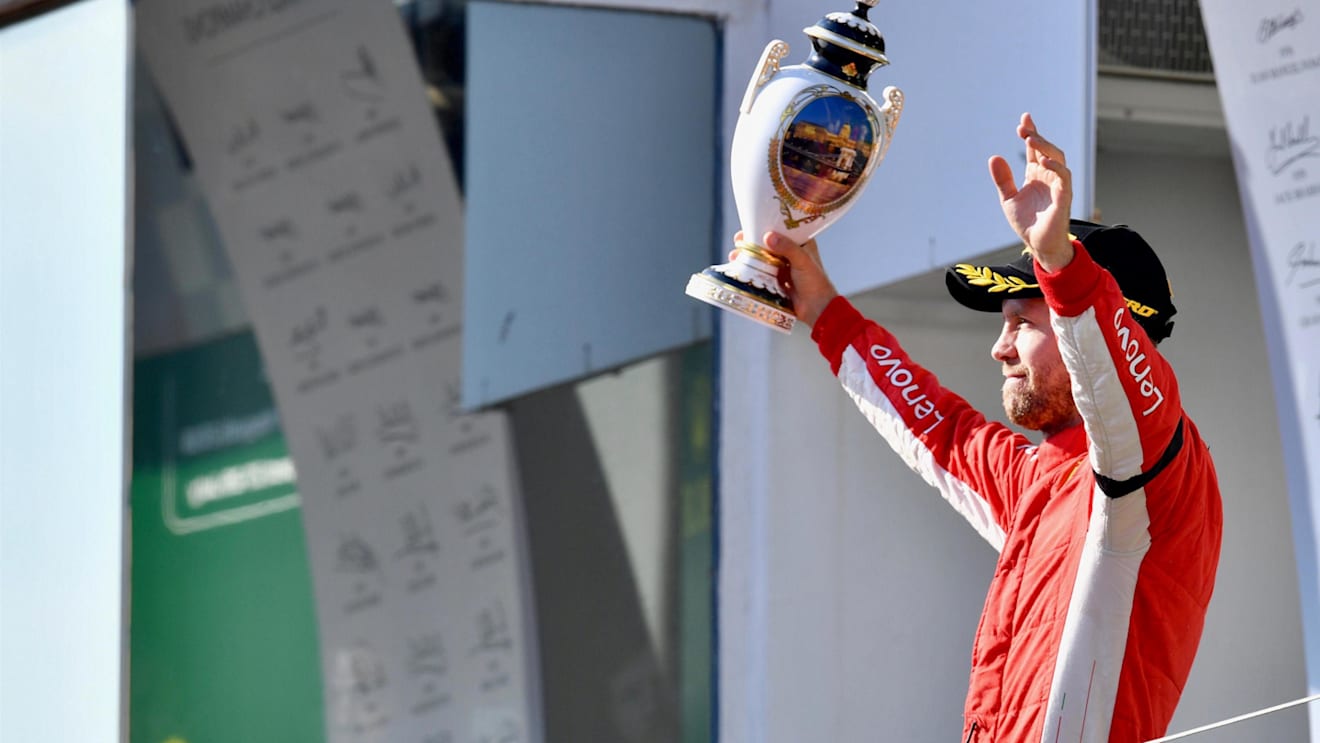 Sebastian Vettel (GER) Ferrari celebrates with the trophy on the podium at Formula One World Championship, Rd12, Hungarian Grand Prix, Race, Hungaroring, Hungary, Sunday 29 July 2018. © Jerry Andre/Sutton Images
