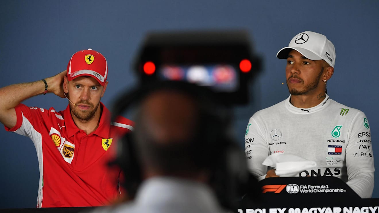 Sebastian Vettel (GER) Ferrari and Lewis Hamilton (GBR) Mercedes-AMG F1 in the Press Conference at Formula One World Championship, Rd12, Hungarian Grand Prix, Race, Hungaroring, Hungary, Sunday 29 July 2018. © Mark Sutton/Sutton Images