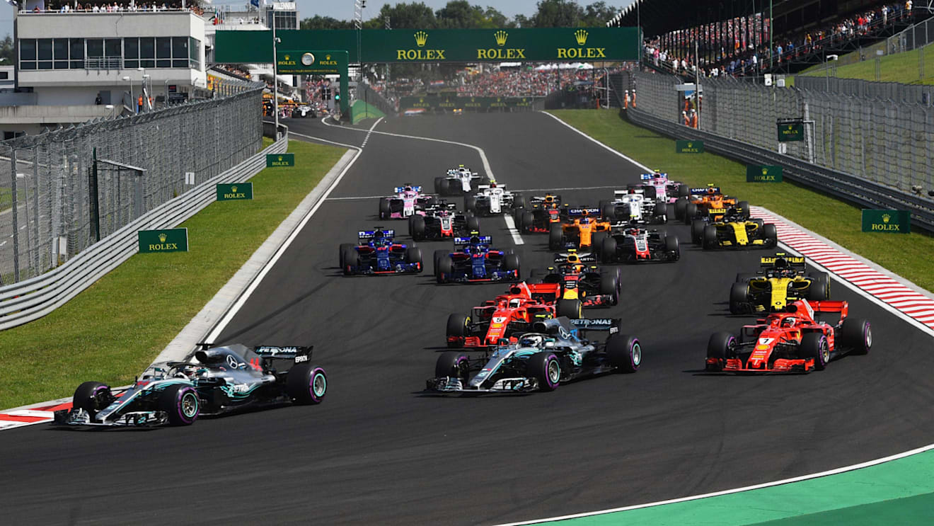 Lewis Hamilton (GBR) Mercedes-AMG F1 W09 EQ Power+ leads Valtteri Bottas (FIN) Mercedes-AMG F1 W09 EQ Power+ at the start of the race at Formula One World Championship, Rd12, Hungarian Grand Prix, Race, Hungaroring, Hungary, Sunday 29 July 2018. © Jerry Andre/Sutton Images