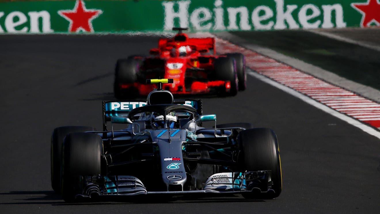 Valtteri Bottas (FIN) Mercedes-AMG F1 W09 EQ Power+ leads Sebastian Vettel (GER) Ferrari SF-71H at Formula One World Championship, Rd12, Hungarian Grand Prix, Race, Hungaroring, Hungary, Sunday 29 July 2018. © Manuel Goria/Sutton Images