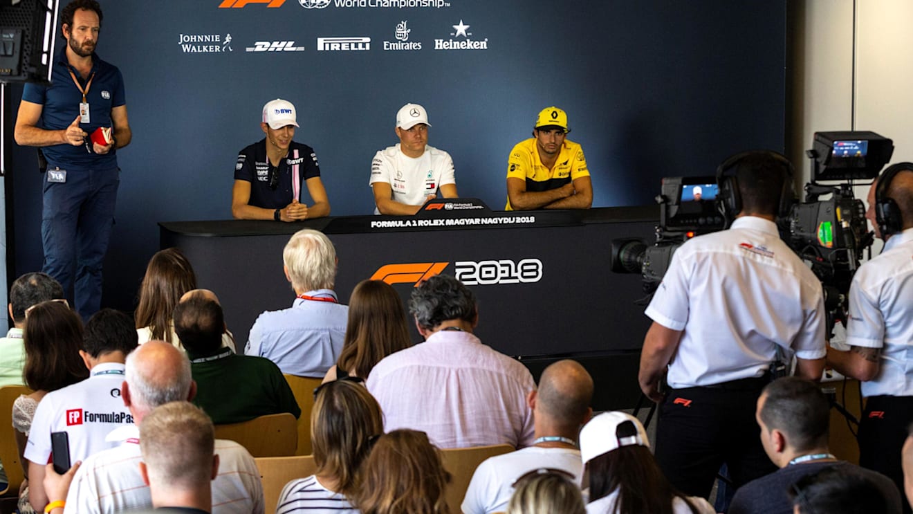 (L to R): Esteban Ocon (FRA) Force India F1, Valtteri Bottas (FIN) Mercedes-AMG F1 and Carlos Sainz jr (ESP) Renault Sport F1 Team in the Press Conference at Formula One World Championship, Rd12, Hungarian Grand Prix, Preparations, Hungaroring, Hungary, Thursday 26 July 2018. © Manuel Goria/Sutton Images