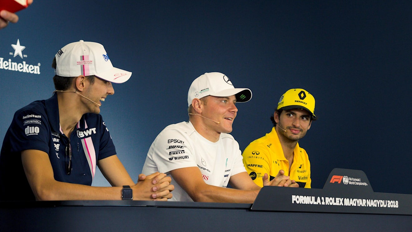 (L to R): Esteban Ocon (FRA) Force India F1, Valtteri Bottas (FIN) Mercedes-AMG F1 and Carlos Sainz jr (ESP) Renault Sport F1 Team in the Press Conference at Formula One World Championship, Rd12, Hungarian Grand Prix, Preparations, Hungaroring, Hungary, Thursday 26 July 2018. © Manuel Goria/Sutton Images