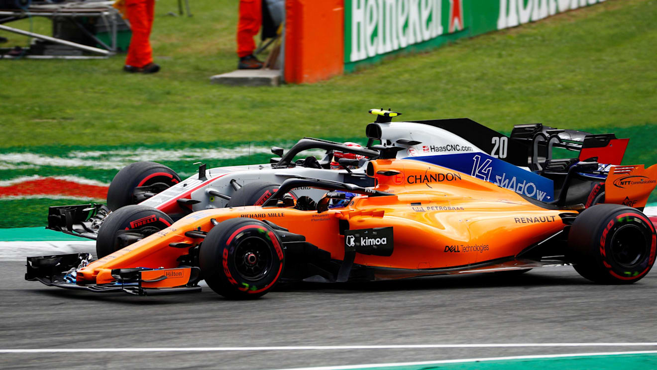 Kevin Magnussen, Haas F1 Team VF-18 and Fernando Alonso, McLaren MCL33 battle in Q2 at Formula One World Championship, Rd14, Italian Grand Prix, Qualifying, Monza, Italy, Saturday 1 September 2018. © Sam Bloxham/LAT/Sutton Images