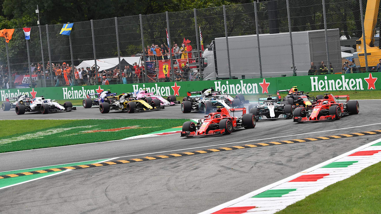 Kimi Raikkonen, Ferrari SF71H leads Sebastian Vettel, Ferrari SF71H and Lewis Hamilton, Mercedes AMG F1 W09 at the start of the race at Formula One World Championship, Rd14, Italian Grand Prix, Race, Monza, Italy, Sunday 2 September 2018. © Jerry Andre/Sutton Images