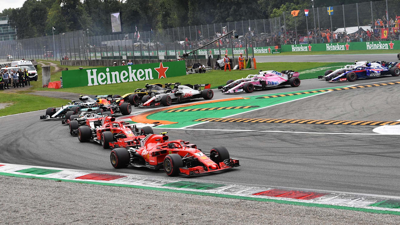 Kimi Raikkonen, Ferrari SF71H, Sebastian Vettel, Ferrari SF71H and Lewis Hamilton, Mercedes AMG F1 W09 at the start of the race at Formula One World Championship, Rd14, Italian Grand Prix, Race, Monza, Italy, Sunday 2 September 2018. © Jerry Andre/Sutton Images