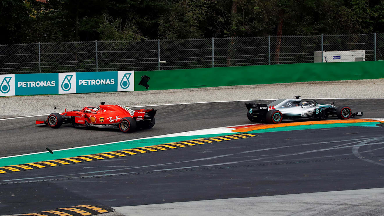 Sebastian Vettel, Ferrari SF71H spins after contact with Lewis Hamilton, Mercedes AMG F1 W09 on lap one at Formula One World Championship, Rd14, Italian Grand Prix, Race, Monza, Italy, Sunday 2 September 2018. © Manuel Goria/Sutton Images