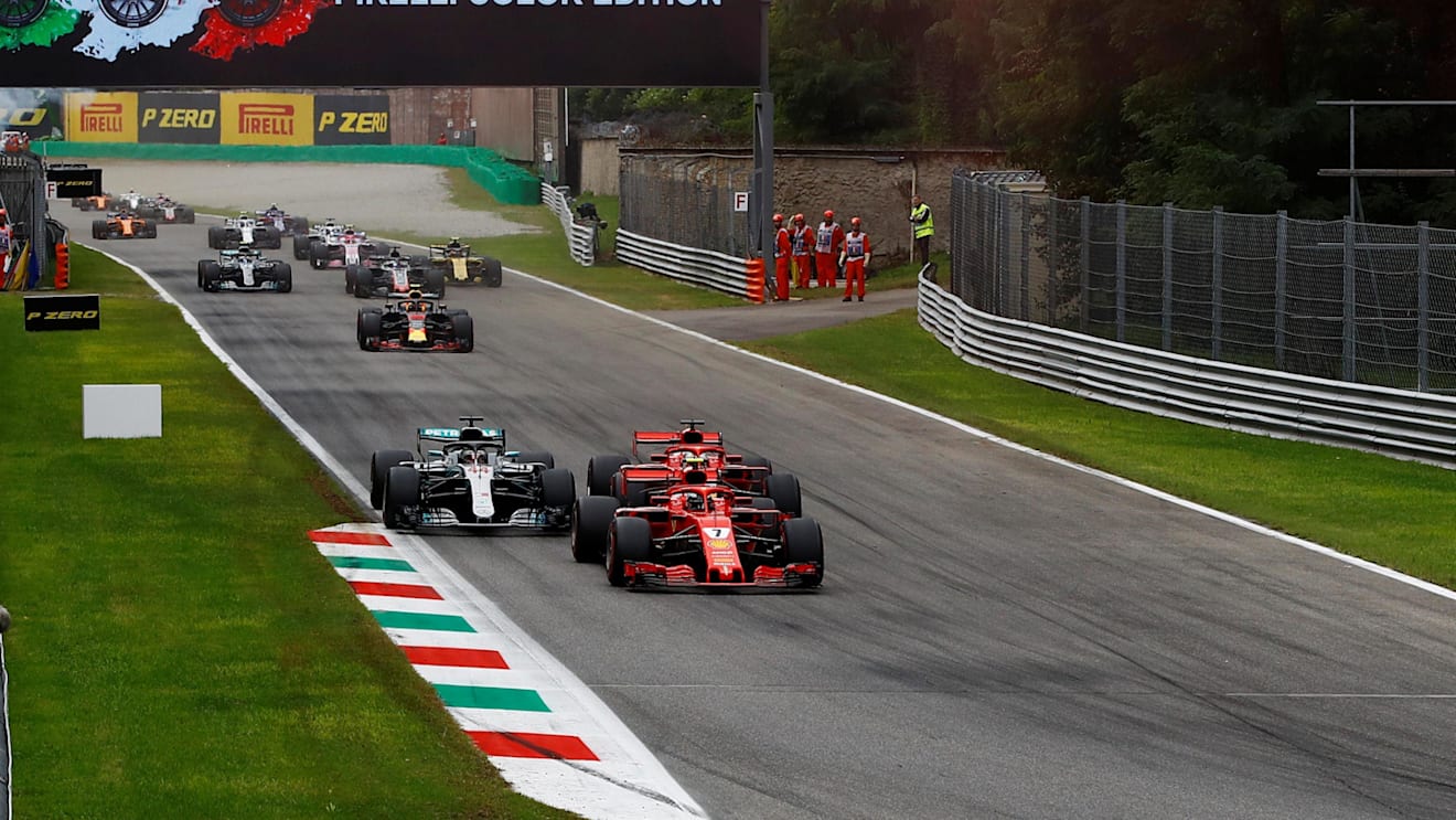 Kimi Raikkonen, Ferrari SF71H, Sebastian Vettel, Ferrari SF71H and Lewis Hamilton, Mercedes AMG F1 W09 on lap one at Formula One World Championship, Rd14, Italian Grand Prix, Race, Monza, Italy, Sunday 2 September 2018. © Manuel Goria/Sutton Images