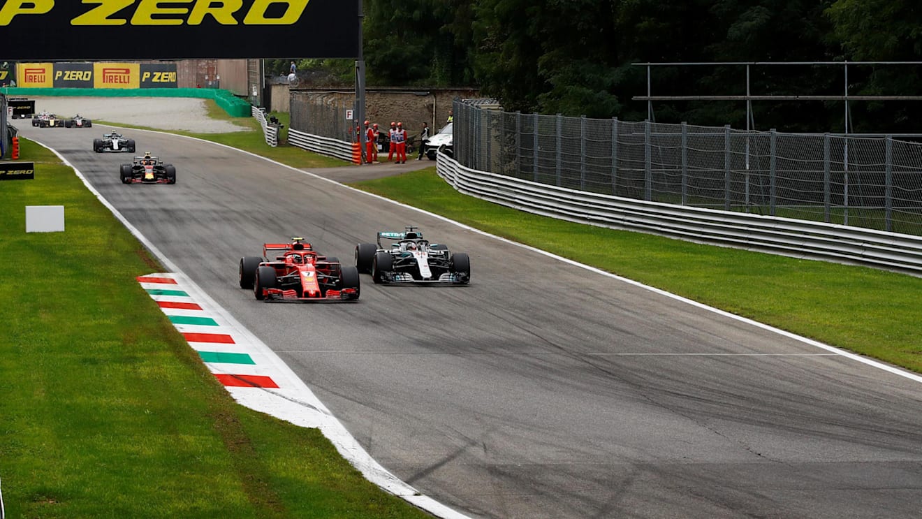 Kimi Raikkonen, Ferrari SF71H and Lewis Hamilton, Mercedes AMG F1 W09 battle at Formula One World Championship, Rd14, Italian Grand Prix, Race, Monza, Italy, Sunday 2 September 2018. © Manuel Goria/Sutton Images
