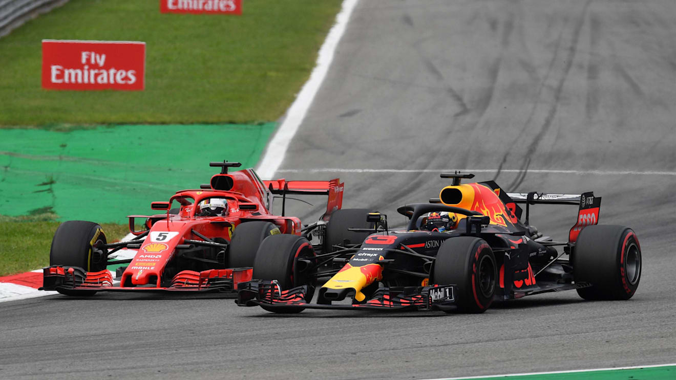 Sebastian Vettel, Ferrari SF71H and Daniel Ricciardo, Red Bull Racing RB14 battle at Formula One World Championship, Rd14, Italian Grand Prix, Race, Monza, Italy, Sunday 2 September 2018. © Mark Sutton/Sutton Images