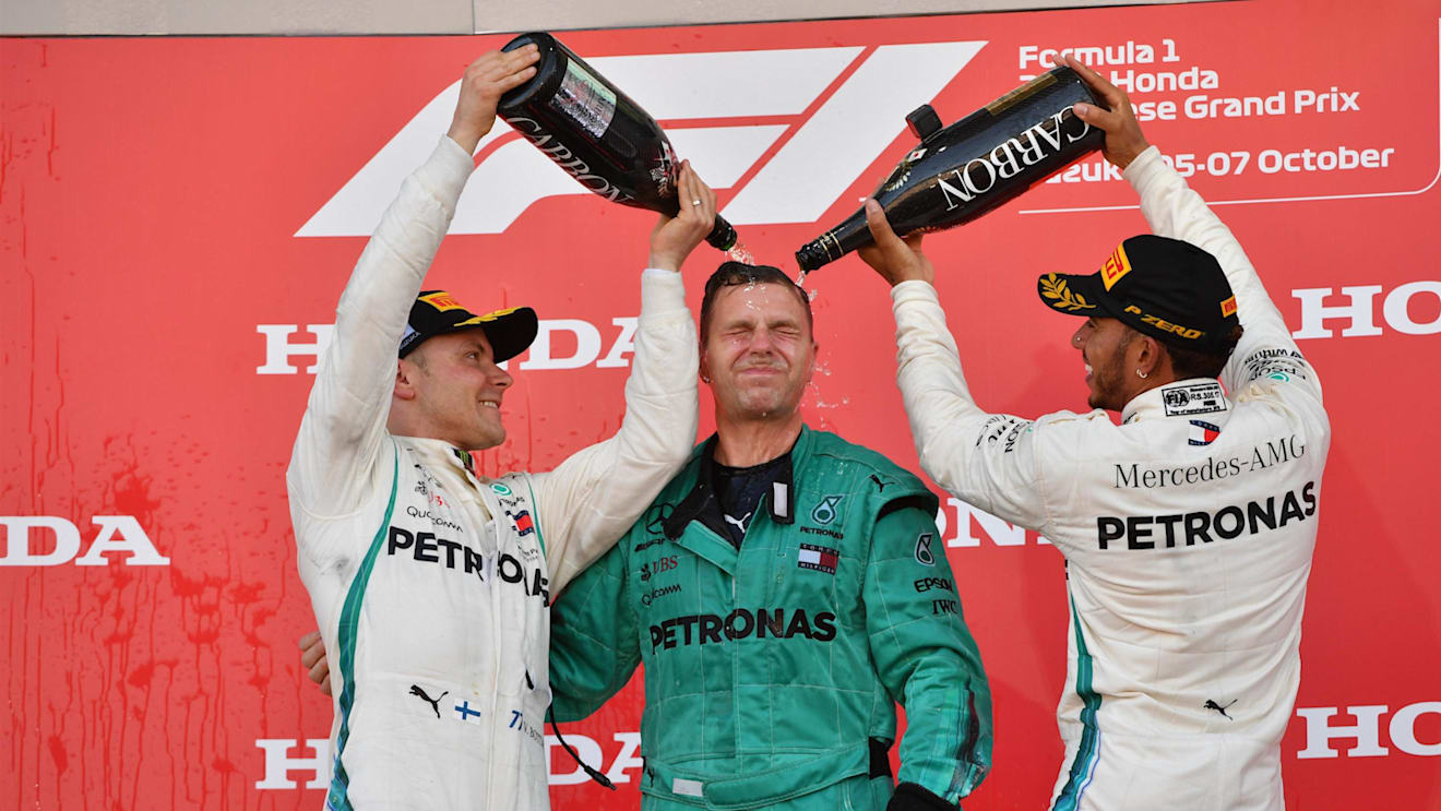 (L to R): Valtteri Bottas, Mercedes AMG F1, Matt Deane, Mercedes AMG F1 Chief Mechanic and Lewis Hamilton, Mercedes AMG F1 celebrate on the podium with the champagne at Formula One World Championship, Rd17, Japanese Grand Prix, Race, Suzuka, Japan, Sunday 7 October 2018.