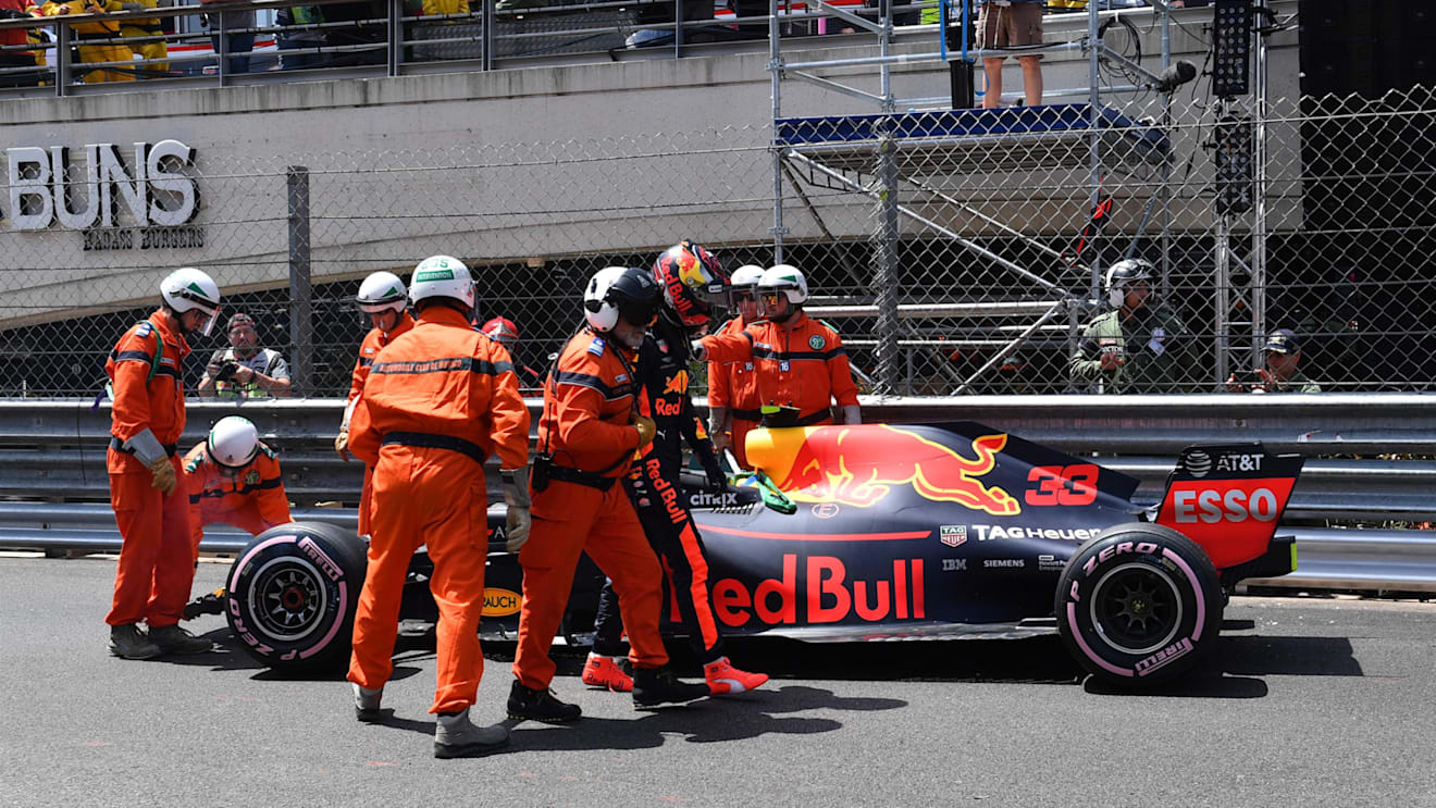 Marshals recover the crashed car of Max Verstappen (NED) Red Bull Racing RB14 in FP3 at Formula One World Championship, Rd6, Monaco Grand Prix, Qualifying, Monte-Carlo, Monaco, Saturday 26 May 2018. © Mark Sutton/Sutton Images