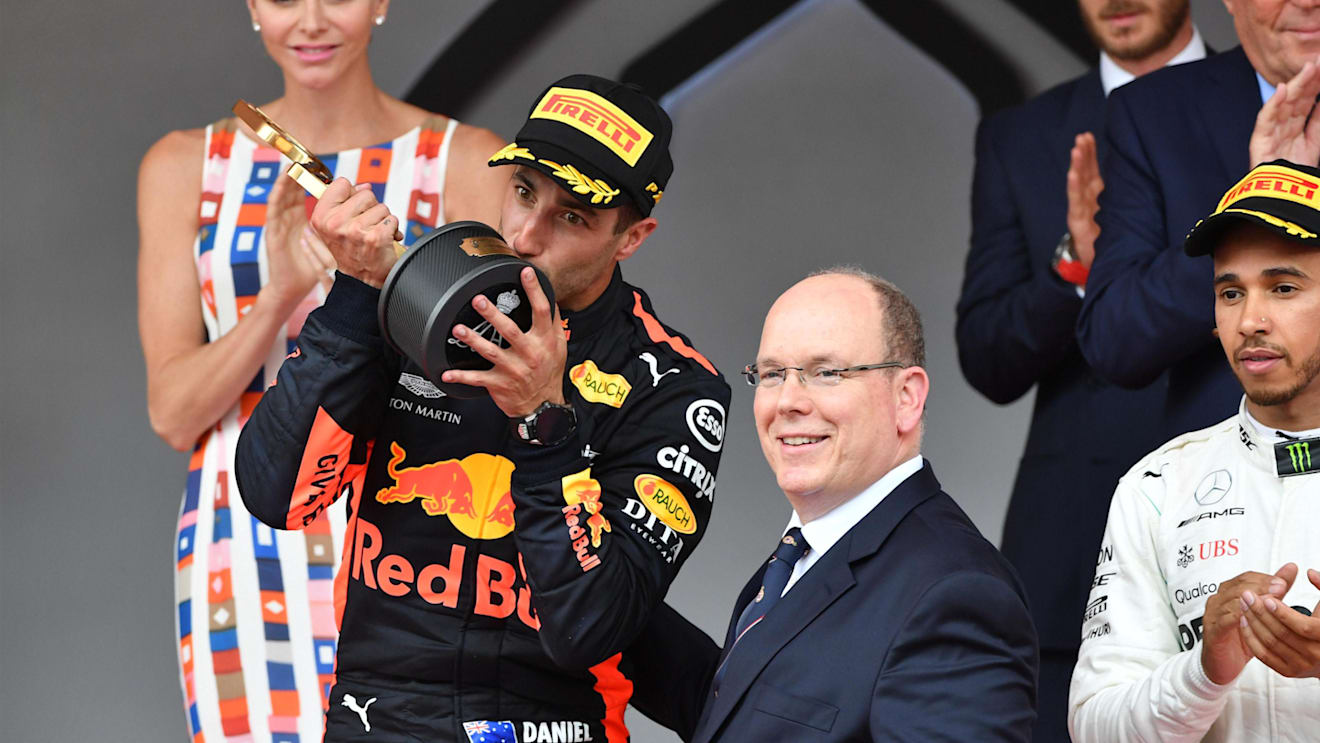 Race winner Daniel Ricciardo (AUS) Red Bull Racing celebrates on the podium with HSH Prince Albert of Monaco (MON) and the trophy at Formula One World Championship, Rd6, Monaco Grand Prix, Race, Monte-Carlo, Monaco, Sunday 27 May 2018. © Mark Sutton/Sutton Images