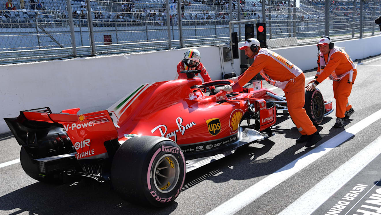 Sebastian Vettel, Ferrari pushes his car back in the pit lane at the end of FP3 at Formula One World Championship, Rd16, Russian Grand Prix, Qualifying, Sochi Autodrom, Sochi, Krasnodar Krai, Russia, Saturday 29 September 2018.
