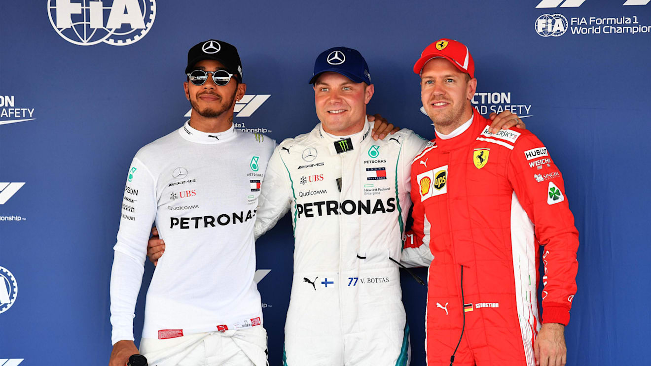 (L to R): Lewis Hamilton, Mercedes AMG F1, Valtteri Bottas, Mercedes AMG F1 and Sebastian Vettel, Ferrari celebrate in parc ferme at Formula One World Championship, Rd16, Russian Grand Prix, Qualifying, Sochi Autodrom, Sochi, Krasnodar Krai, Russia, Saturday 29 September 2018.