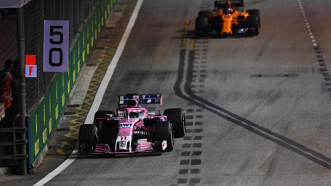 Sergio Perez, Racing Point Force India VJM11 and Fernando Alonso, McLaren MCL33 at Formula One World Championship, Rd15, Singapore Grand Prix, Qualifying, Marina Bay Circuit, Singapore, Saturday 15 September 2018.