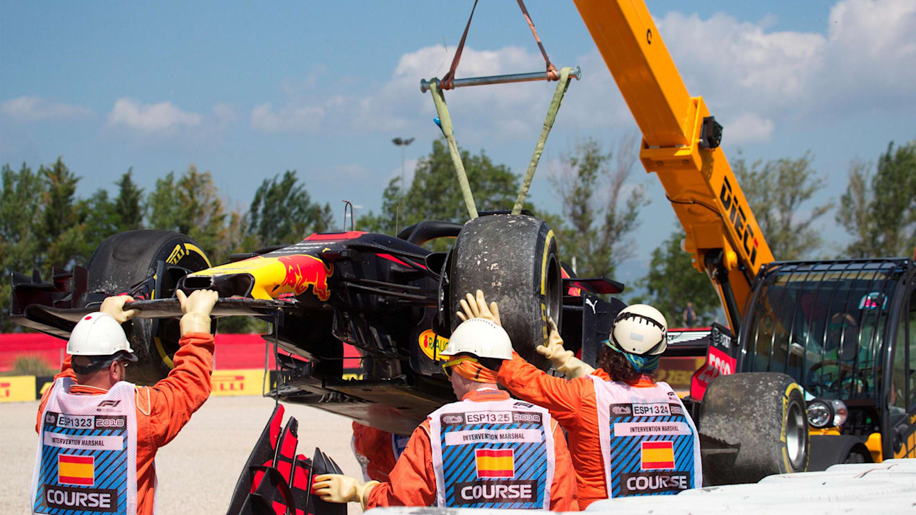 The crashed car of Daniel Ricciardo (AUS) Red Bull Racing RB14 is recovered in FP1 at Formula One World Championship, Rd5, Spanish Grand Prix, Practice, Barcelona, Spain, Friday 11 May 2018. © Rubio/Sutton Images