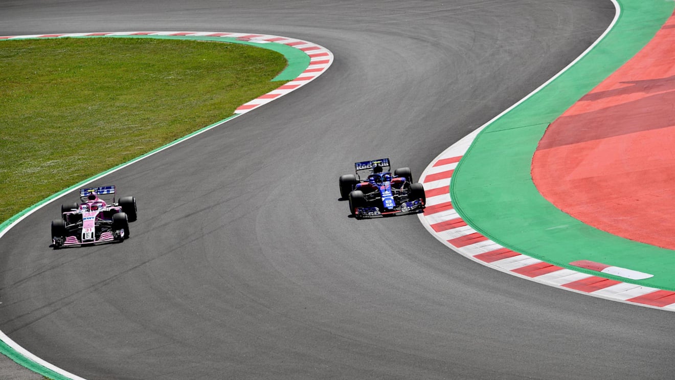 Esteban Ocon (FRA) Force India VJM11 and Pierre Gasly (FRA) Scuderia Toro Rosso STR13 at Formula One World Championship, Rd5, Spanish Grand Prix, Practice, Barcelona, Spain, Friday 11 May 2018. © Jerry Andre/Sutton Images