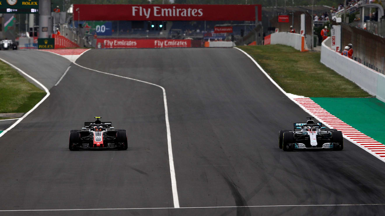 Kevin Magnussen (DEN) Haas VF-18 and Lewis Hamilton (GBR) Mercedes-AMG F1 W09 EQ Power+ at Formula One World Championship, Rd5, Spanish Grand Prix, Qualifying, Barcelona, Spain, Saturday 12 May 2018. © Manuel Goria/Sutton Images