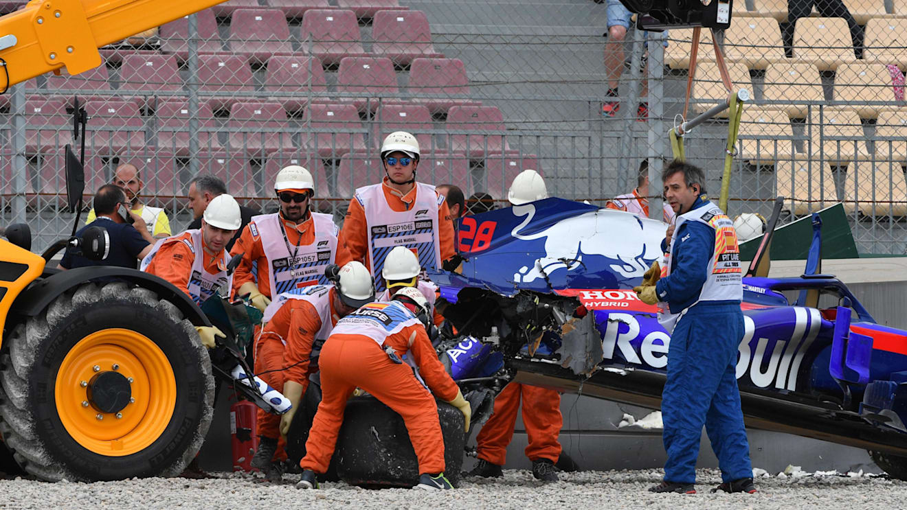 The crashed car of Brendon Hartley (NZL) Scuderia Toro Rosso STR13 is recovered in FP3 at Formula One World Championship, Rd5, Spanish Grand Prix, Qualifying, Barcelona, Spain, Saturday 12 May 2018. © Mark Sutton/Sutton Images