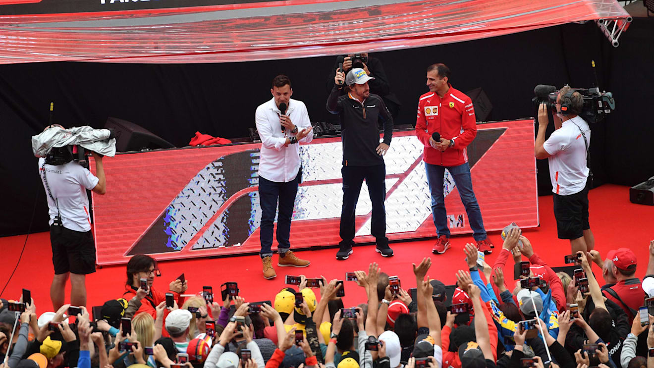 Will Buxton (GBR) FOM TV Presenter with Fernando Alonso (ESP) McLaren and Marc Gene (ESP) Ferrari on the Fanzone stage at Formula One World Championship, Rd5, Spanish Grand Prix, Qualifying, Barcelona, Spain, Saturday 12 May 2018. © Jerry Andre/Sutton Images