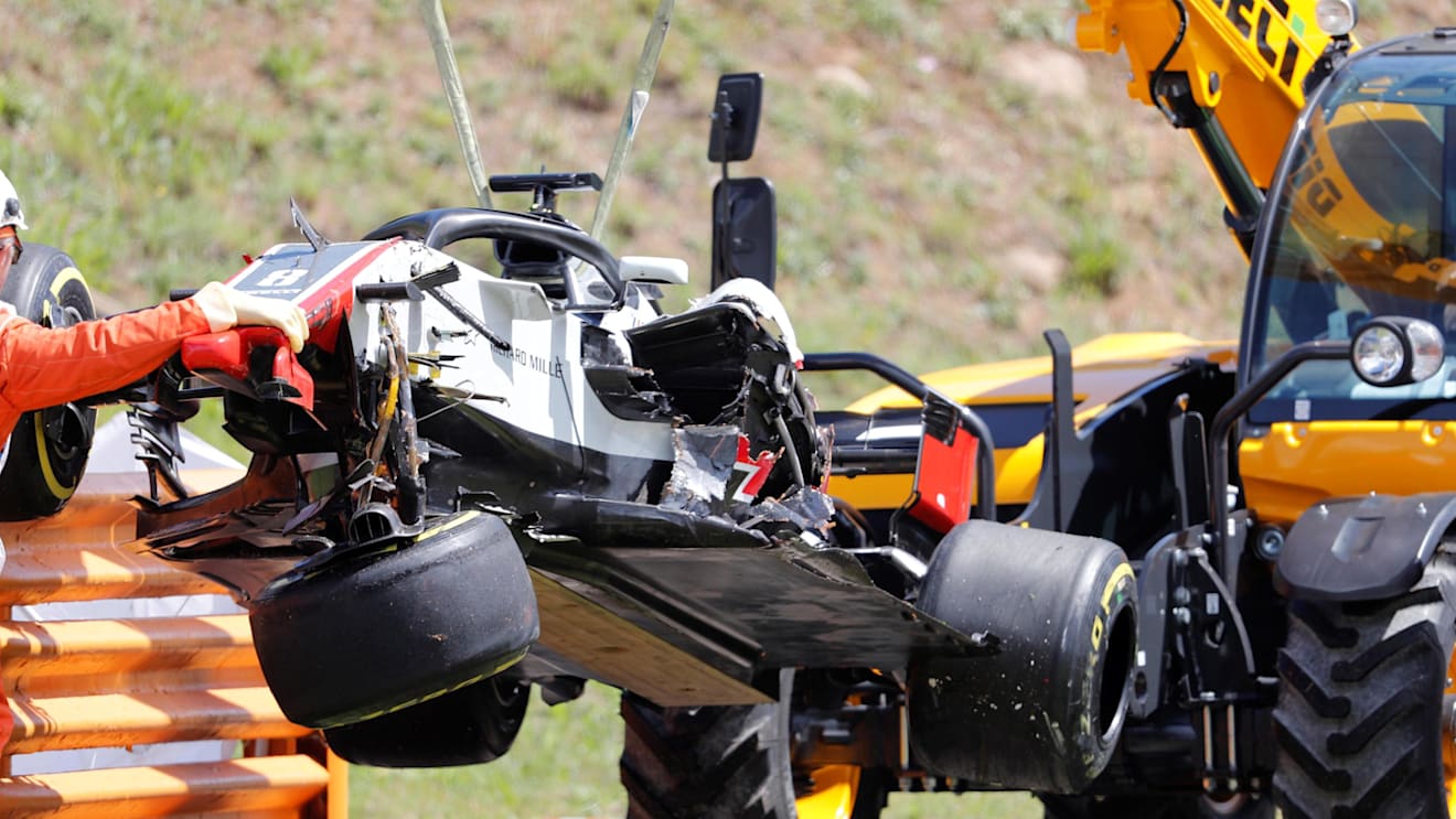 The crashed car of Romain Grosjean (FRA) Haas VF-18 is recovered at Formula One World Championship, Rd5, Spanish Grand Prix, Race, Barcelona, Spain, Sunday 13 May 2018. © Zak Mauger/LAT/Sutton Images