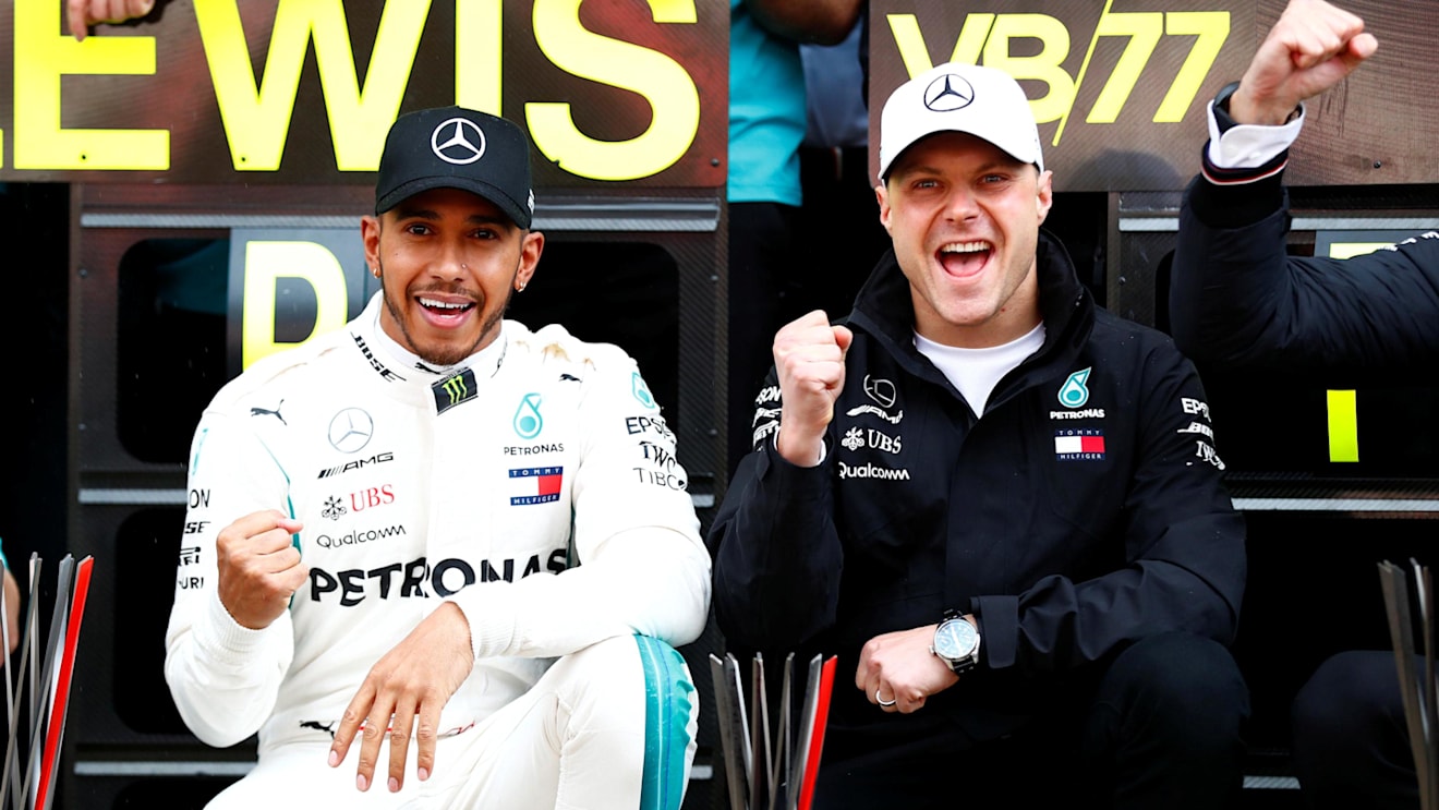 Race winner Lewis Hamilton (GBR) Mercedes-AMG F1 and Valtteri Bottas (FIN) Mercedes-AMG F1 celebrate with the team at Formula One World Championship, Rd5, Spanish Grand Prix, Race, Barcelona, Spain, Sunday 13 May 2018. © Sam Bloxham/LAT/Sutton Images