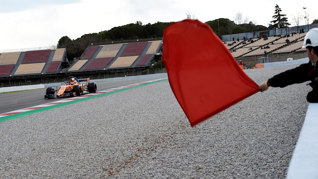 Marshal waves the red flag at Formula One Testing, Day Three, Barcelona, Spain, 8 March 2018. © Jerry Andre/Sutton Images