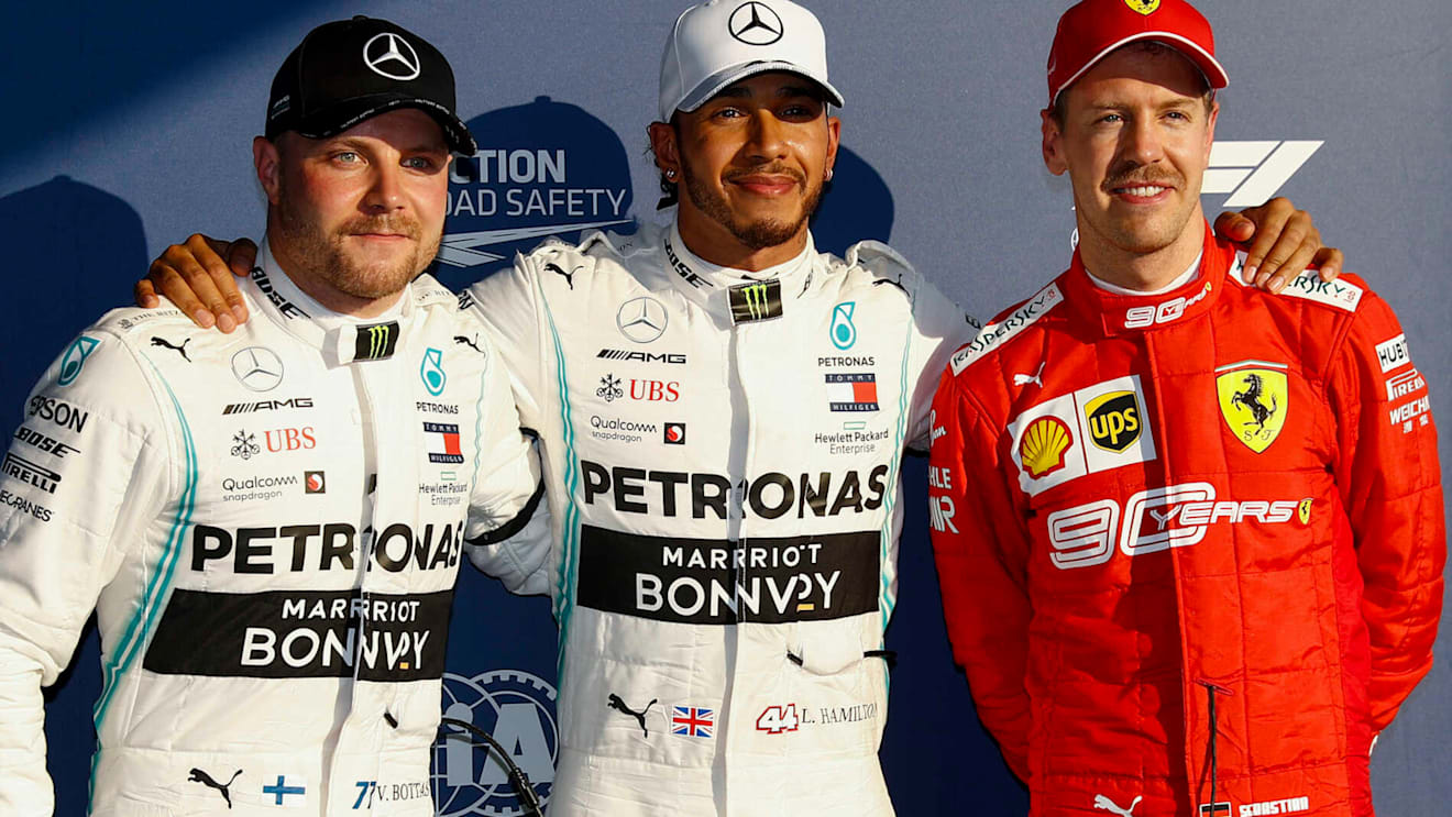 MELBOURNE GRAND PRIX CIRCUIT, AUSTRALIA - MARCH 16: Valtteri Bottas, Mercedes AMG F1, Pole Sitter Lewis Hamilton, Mercedes AMG F1 and Sebastian Vettel, Ferrari in Parc Ferme during the Australian GP at Melbourne Grand Prix Circuit on March 16, 2019 in Melbourne Grand Prix Circuit, Australia. (Photo by Glenn Dunbar / LAT Images)