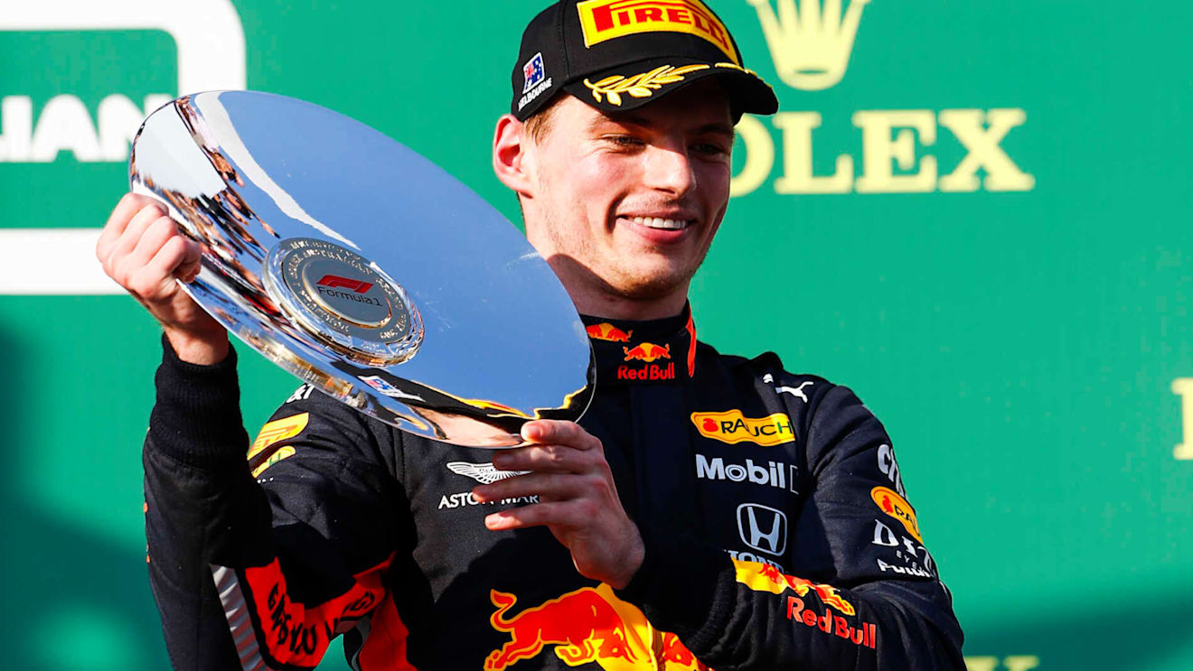 MELBOURNE GRAND PRIX CIRCUIT, AUSTRALIA - MARCH 17: Max Verstappen, Red Bull Racing celebrates on the podium with the trophy during the Australian GP at Melbourne Grand Prix Circuit on March 17, 2019 in Melbourne Grand Prix Circuit, Australia. (Photo by Glenn Dunbar / LAT Images)
