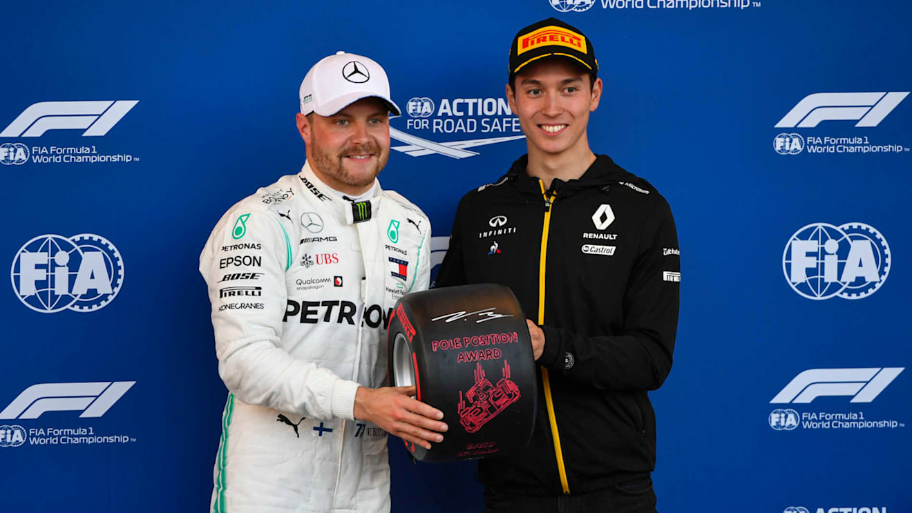BAKU CITY CIRCUIT, AZERBAIJAN - APRIL 27: Pole man Valtteri Bottas, Mercedes AMG F1, receives his Pirelli Pole Position award from Jack Aitken, Development Driver, Renault F1 during the Azerbaijan GP at Baku City Circuit on April 27, 2019 in Baku City Circuit, Azerbaijan. (Photo by Mark Sutton / Sutton Images)
