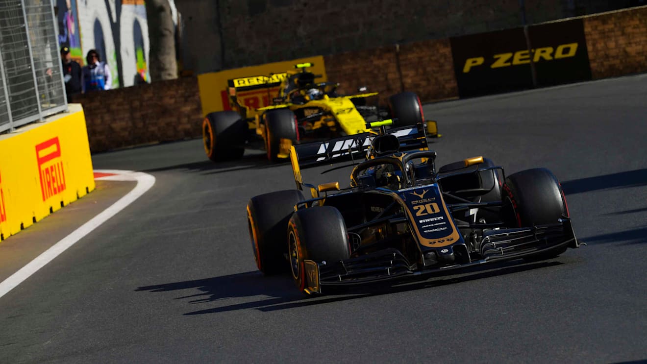 BAKU CITY CIRCUIT, AZERBAIJAN - APRIL 28: Kevin Magnussen, Haas VF-19, leads Nico Hulkenberg, Renault R.S. 19 during the Azerbaijan GP at Baku City Circuit on April 28, 2019 in Baku City Circuit, Azerbaijan. (Photo by Jerry Andre / Sutton Images)