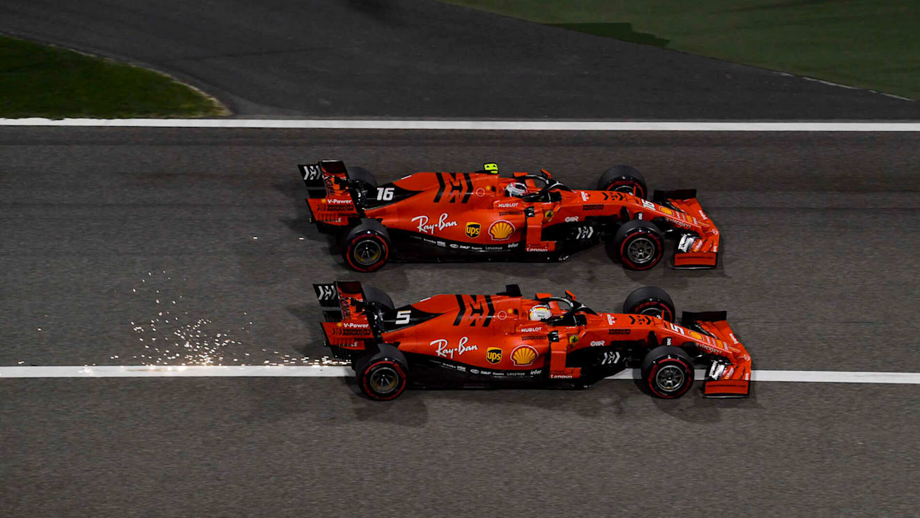 BAHRAIN INTERNATIONAL CIRCUIT, BAHRAIN - MARCH 31: Charles Leclerc, Ferrari SF90 overtakes Sebastian Vettel, Ferrari SF90 for the lead during the Bahrain GP at Bahrain International Circuit on March 31, 2019 in Bahrain International Circuit, Bahrain. (Photo by Mark Sutton / Sutton Images)